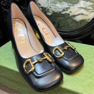 Gucci Black Heels with Gold Accents